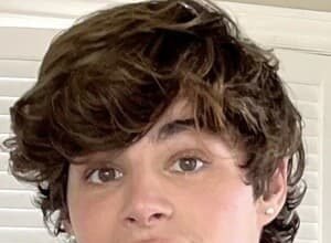 French TikTok star Pierre Boo smiling during a content shoot